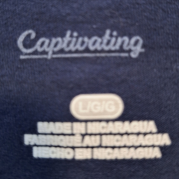 A Captivating West Virginia Mountaineers long sleeve t-shirt in a large. NWT - Picture 4 of 7